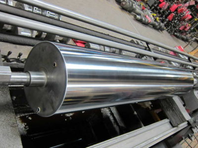 Machine roller restored by hard chrome plating, grinding and polishing