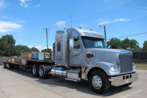 Power Engineering pickup-delivery tractor trailer, front view