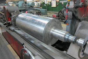 Machine roller restored using submerged arc welding and grinding