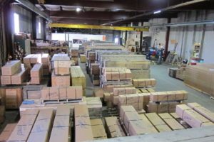 Power Engineering Company warehouse showing crates with crankshafts inside