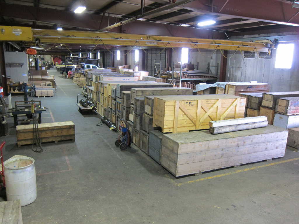 Power Engineering Company warehouse showing crates with crankshafts inside